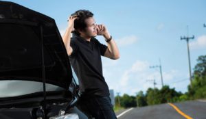 Frustrated man on phone with insurance after finding out at fault party isn't insured